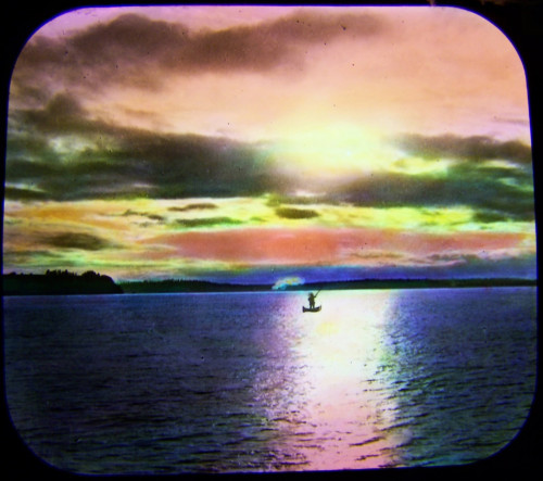 Magic lantern slide of Katherine Bowden's Hiawatha going into sunset.